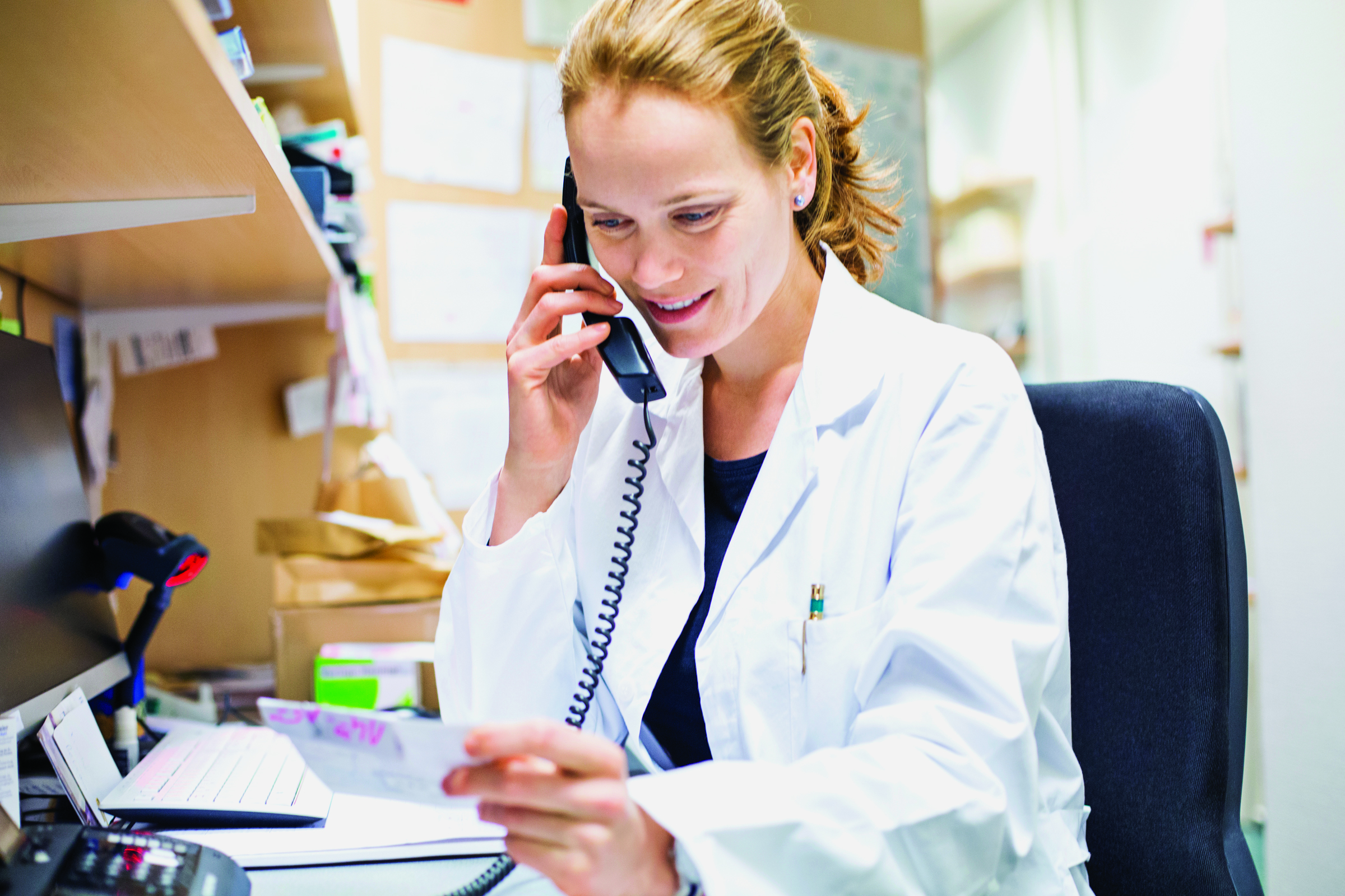 female doctor talking on phone