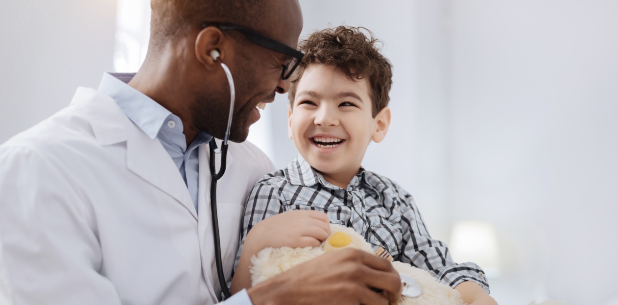 Doctor with small child