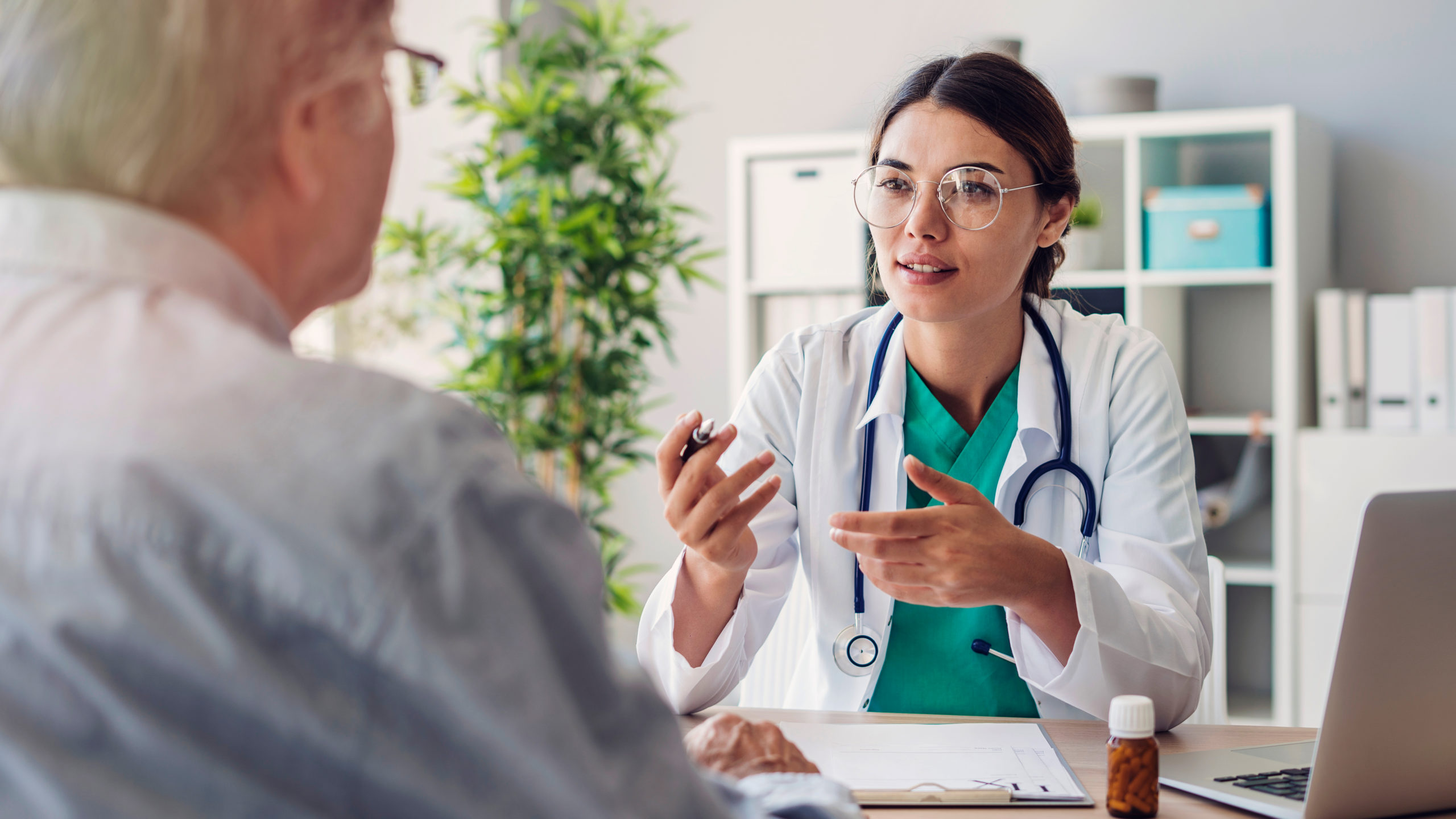 Doctor explaining something to a patient