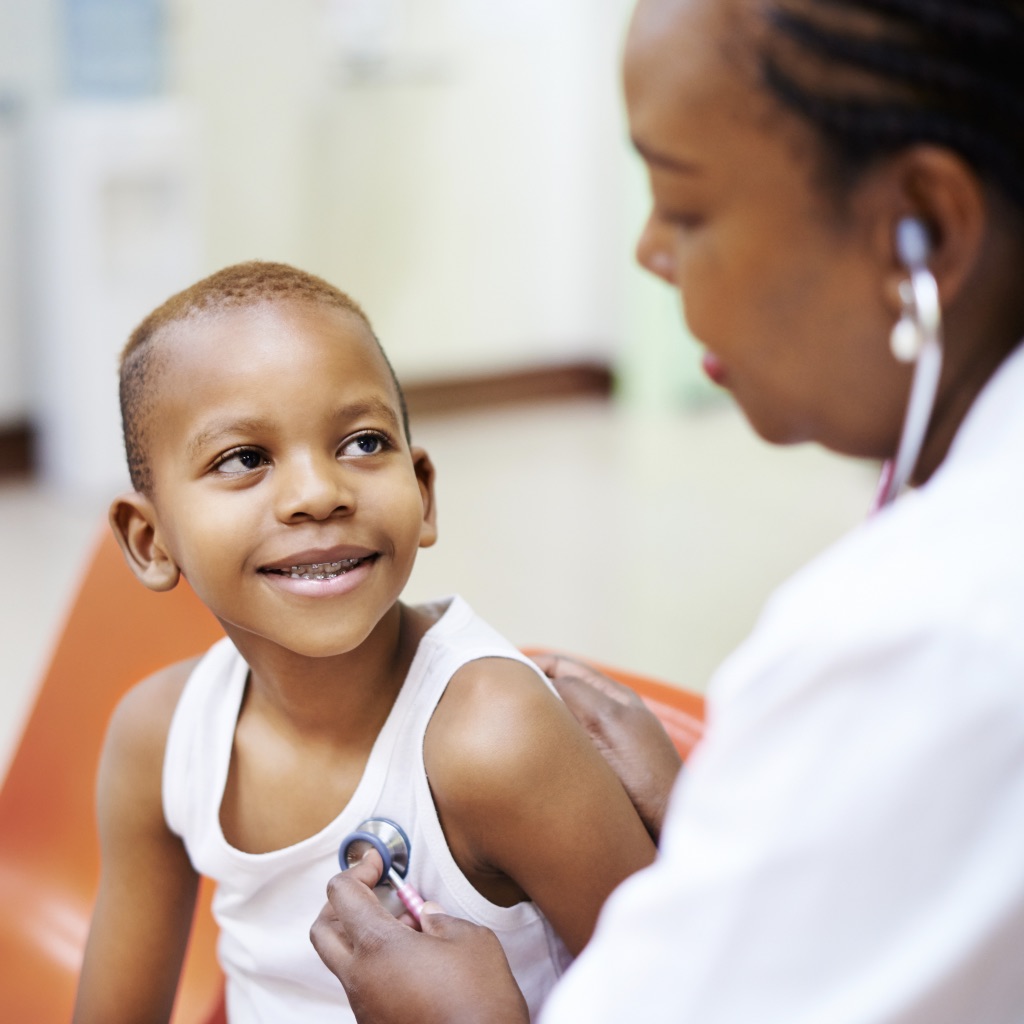 Doctor with small child